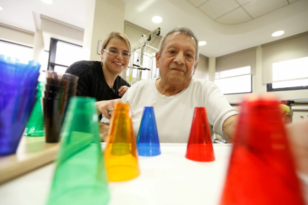 Man doing occupational therapy rehabilitation exercises.